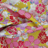 Tissu coton jaune fleurs de cerisier roses, mauves et blanches (5m x 110cm)