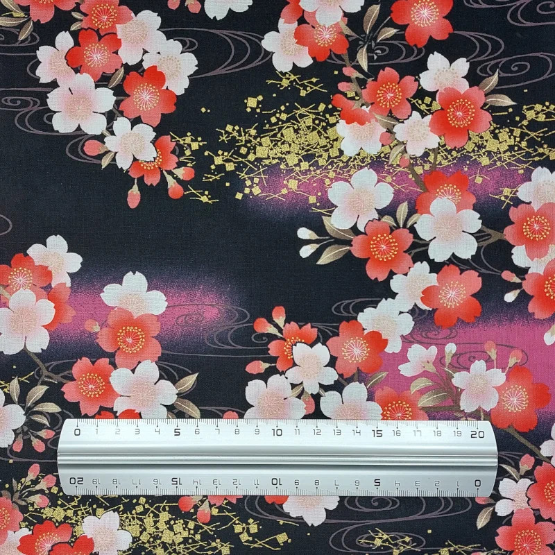 Tissu coton noir fleurs de cerisier rouges saumon et tourbillons (5m x 110cm)