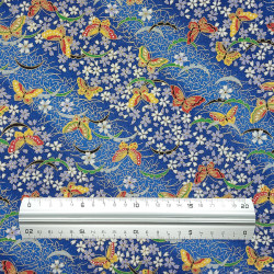 Tissu coton bleu marine papillons fleurs et feuilles (110cm)