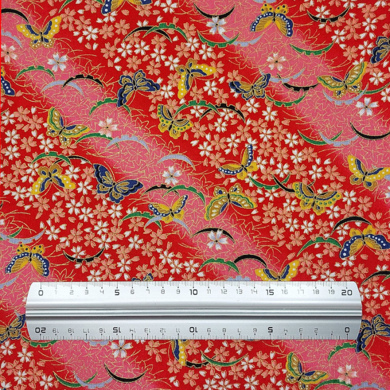 Tissu coton rouge papillons fleurs et feuilles (110cm)