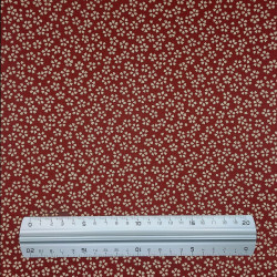 Tissu coton petites fleurs de cerisier fond rouge foncé (110cm)