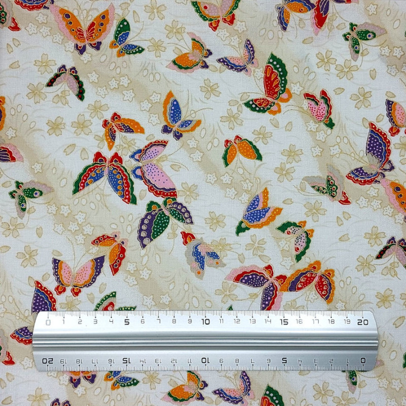 Ivory white fabric with small colorful butterflies patterns (110cm)